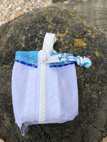 Small handy pouch that fits keys, poop bags and credit cards. Useful for dog walks, going out for a jog, or going to the gym.