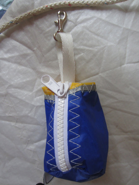 Small handy pouch that fits keys, poop bags and credit cards. Useful for dog walks, going out for a jog, or going to the gym.