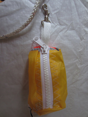 Small handy pouch that fits keys, poop bags and credit cards. Useful for dog walks, going out for a jog, or going to the gym.